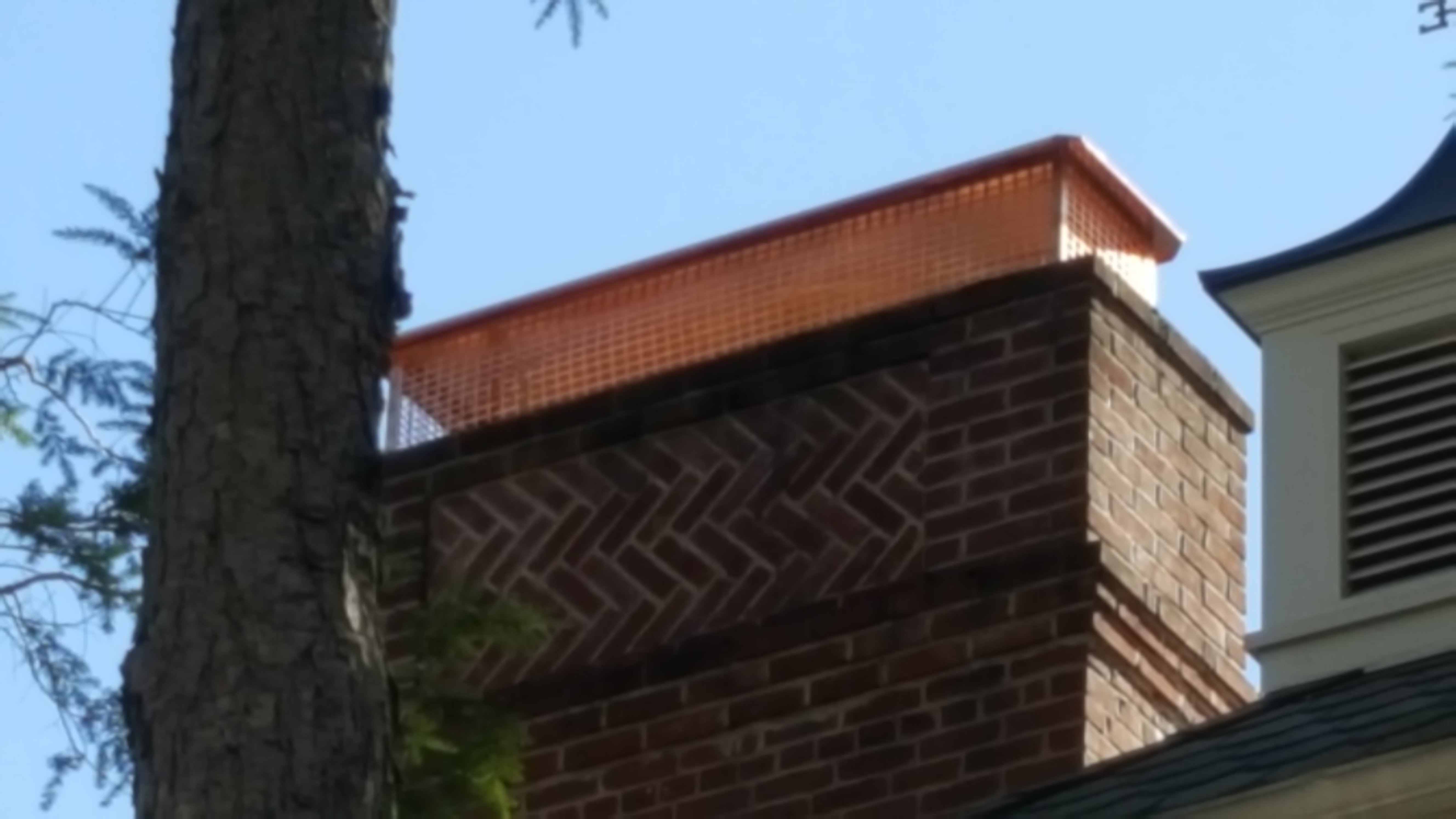 New stainless steel chimney cap installed in Massapequa, NY