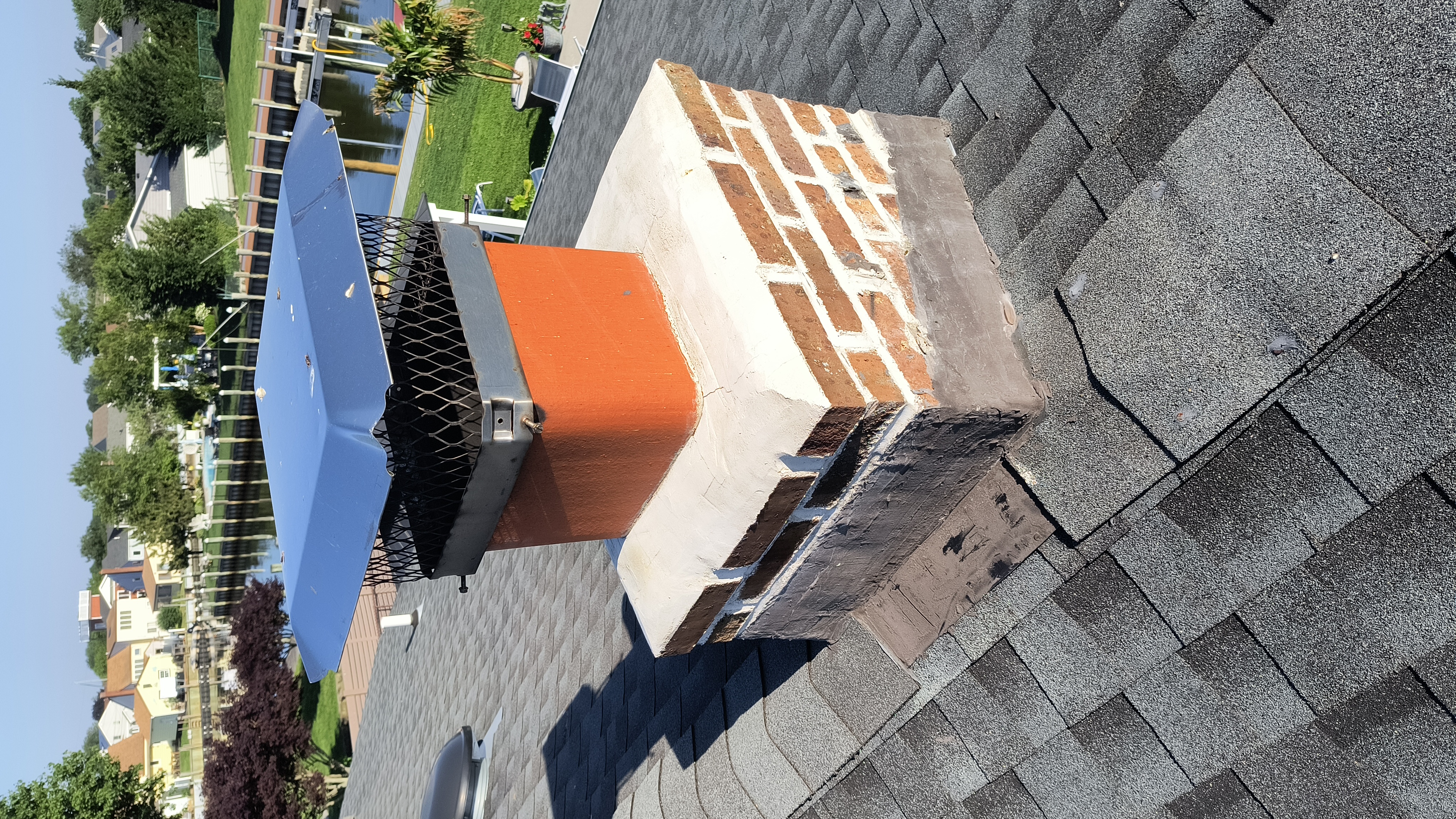 Full chimney masonry rebuild and restoration in Massapequa, NY